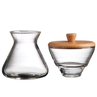 Chemex Cream and Sugar Set with clear borosilicate glass and wooden lid side by side on white background