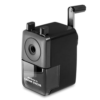 Caran d’Ache Plastic Pencil Sharpener in black with manual crank and transparent shavings container