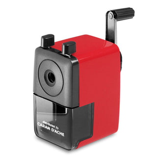 Caran d’Ache Plastic Pencil Sharpener in red with crank handle and transparent shavings container