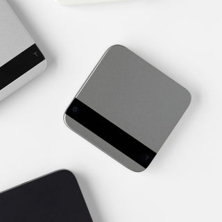 ACAIA Lunar Digital Scale in sleek gray with touch controls and compact square design shown from above