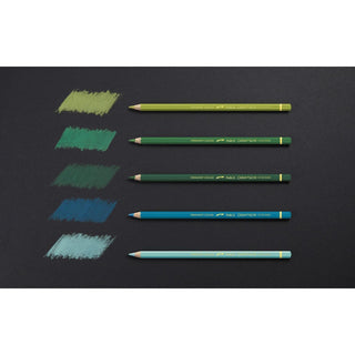 Caran d'Ache Pablo Colour Pencil set in green and blue shades with textured color swatches on black background