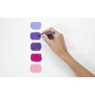 Caran d'Ache Neocolor II Water-Soluble Wax Pastel applying rich purple tones on white paper