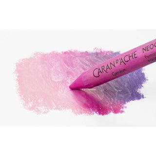 Caran d’Ache Neocolor II Water-Soluble Wax Pastel blending pink and purple shades with soft texture