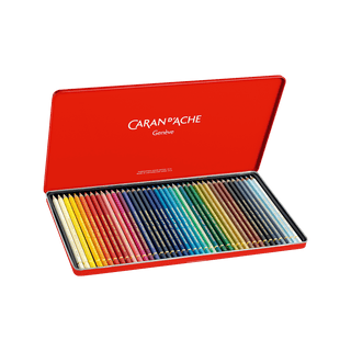 Caran d'Ache Pablo Colour Pencil set displayed in an open red metal case with vibrant color range