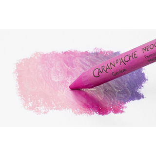 Caran d'Ache Neocolor II Water-Soluble Wax Pastel in pink blending into purple textured strokes