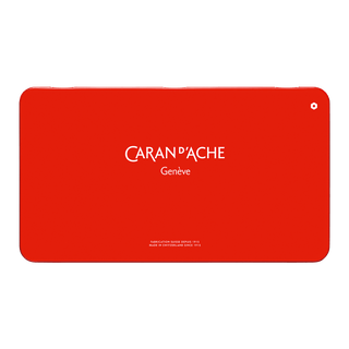 Red metal tin case featuring Caran d’Ache Neocolor II Water-Soluble Wax Pastel logo centered on top