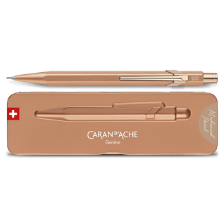 Caran d'Ache 844 Premium Mechanical Pencil with hexagonal bronze aluminum body and matching case