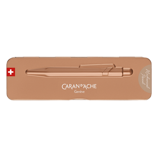 Caran d'Ache 844 Premium Mechanical Pencil in metallic bronze tin case with embossed pen outline