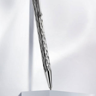 Caran d’Ache Ecridor™ Venetian Platinum Ballpoint Pen with hammered platinum brass body close-up