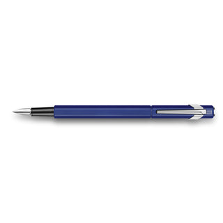 Caran d'Ache 849 Fountain Pen Collection with sleek blue hexagonal aluminum body and polished silver nib