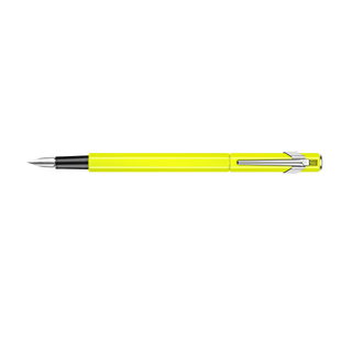 Caran d'Ache 849 Fountain Pen Collection with bright yellow hexagonal lightweight aluminum body and silver clip