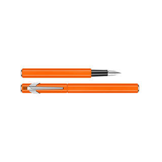 Caran d'Ache 849 Fountain Pen Collection with vibrant orange aluminum body and sleek silver nib design