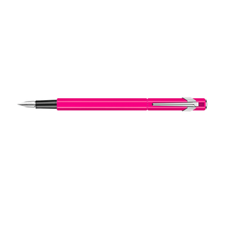 Caran d'Ache 849 Fountain Pen Collection in bright pink with silver clip and hexagonal aluminum body