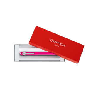 Caran d'Ache 849 Fountain Pen Collection with vibrant pink aluminum body in red branded box