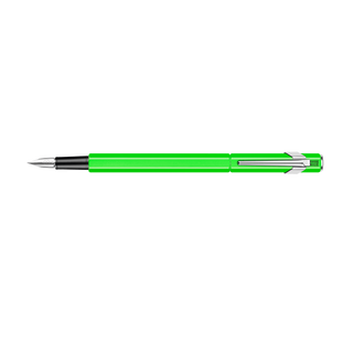 Caran d'Ache 849 Fountain Pen Collection with bright green hexagonal aluminum body and silver clip
