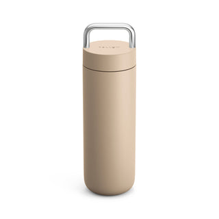 Fellow Carter Carry Tumbler (20oz/591ml) in beige with stainless steel handle and matte finish design