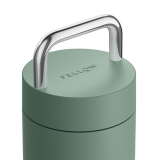 Fellow Carter Carry Tumbler (20oz/591ml) seafoam green lid with stainless steel carry handle close-up