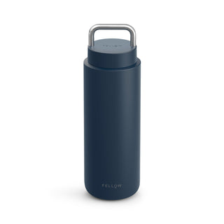 Fellow Carter Carry Tumbler (32oz/946ml) in matte navy with stainless steel handle and slim design