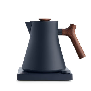 Fellow Corvo EKG Pro Electric Kettle (120V) with matte black body and wooden handle on square base
