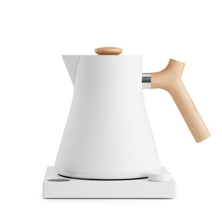 Fellow Corvo EKG Electric Kettle (120V) with matte white body and wooden handle on square base