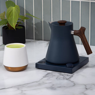 Fellow Corvo EKG Electric Kettle (120V) navy blue stainless steel with wooden handle on base
