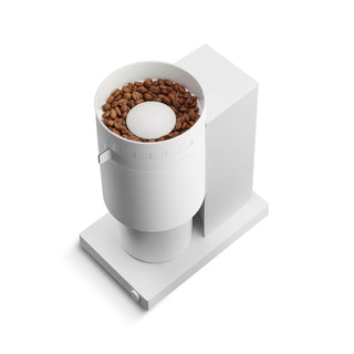 FELLOW Opus Conical Burr Grinder (120V) with white matte finish and visible coffee beans inside hopper