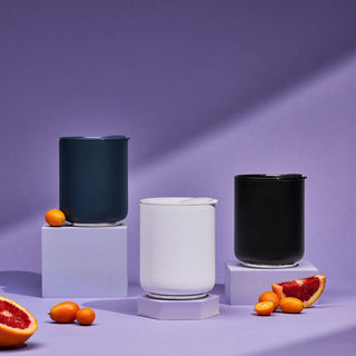 FELLOW Rocky Lowball Tumbler (10oz/296ml) set in navy, white, and black stainless steel with lids on purple background