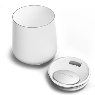 FELLOW Ruby Wine Tumbler (12oz/355ml) in white stainless steel with matching lid beside it