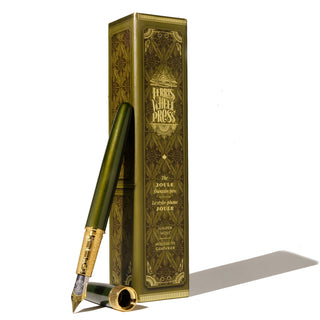 The Joule Fountain Pen - Juniper Moss | Ferris Wheel Press with brass nib and textured green lacquer finish standing by decorative box