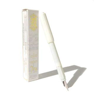The Carousel Fountain Pen - French Vanilla | Ferris Wheel Press with elegant white body and sleek silver nib beside packaging box