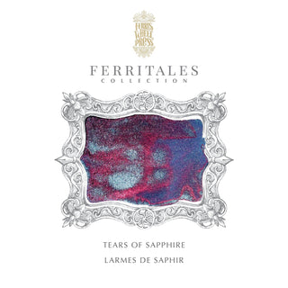 Intricate swirled ink in blue and red hues inside ornate silver frame for Tears of Sapphire Fountain Pen Inks - 20ml Bottled | Ferris Wheel Press