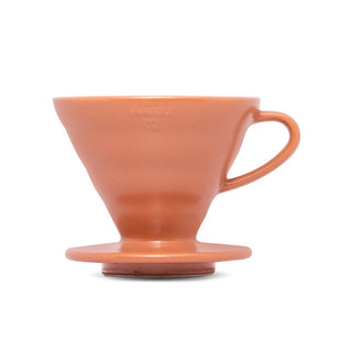 HARIO V60-02 Ceramic Dripper in terra cotta color with smooth porcelain finish and ergonomic handle