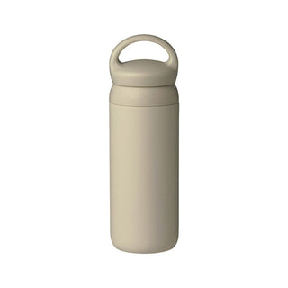 KINTO Day Off Tumbler 500ml in beige stainless steel with a rounded handle lid for easy carrying
