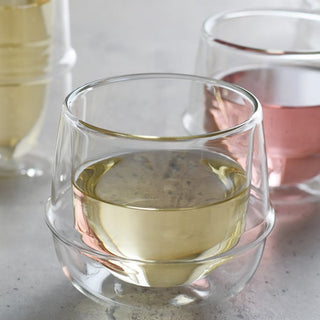 KINTO KRONOS Double Wall Wine Glass 250ml filled with white wine showing clear heat-resistant glass design