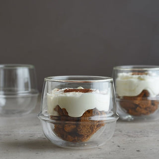 KINTO KRONOS Double Wall Wine Glass 250ml showing clear heat-resistant glass with dessert inside