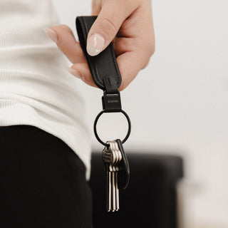 Orbitkey Loop Keychain in black nappa leather held with metal ring securing multiple keys