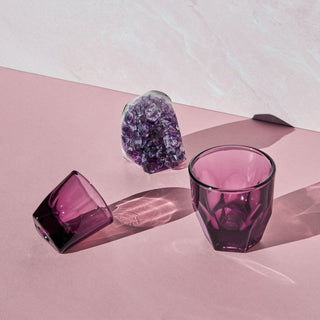 notNeutral VERO Cappuccino Glass 6oz in purple glass with faceted texture shown with amethyst crystal