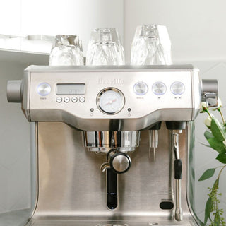 notNeutral VERO Espresso Glass 3oz stacked upside down on stainless steel espresso machine top