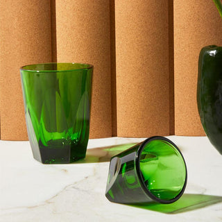 notNeutral VERO Latte Glass 12oz in vibrant green thick glass with geometric facets on marble surface