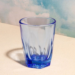 notNeutral VERO Latte Glass 12oz in blue tinted glass with textured sides and smooth rim