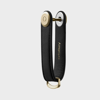 Orbitkey Saffiano Leather Key Organiser in black with gold hardware and textured leather finish