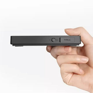 Timemore Black Mirror Mini Coffee Scale held sideways showing USB-C port and power button details