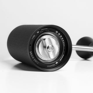 Timemore Chestnut C3 ESP PRO Grinder showing black textured aluminum body and stainless steel burr adjustment dial