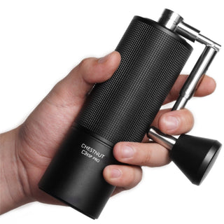 Timemore Chestnut C3 ESP PRO Grinder held in hand showing textured aluminum body and stainless steel crank handle