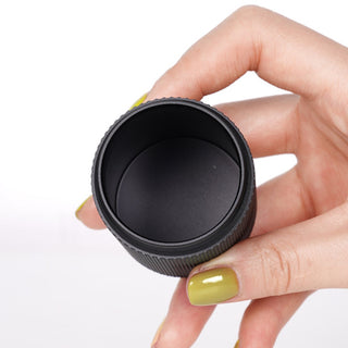 Timemore Chestnut Slim 3 Grinder held showing black aluminum alloy grinding chamber interior