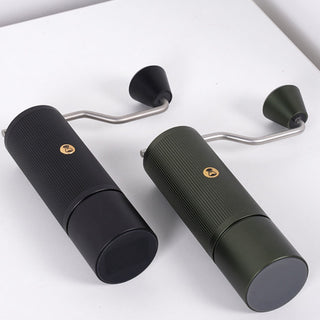 Timemore Chestnut X Lite hand grinders in black and green with textured stainless steel bodies and curved handles