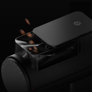 Timemore Sculptor 078S All-Purpose Grinder (120V) with black aluminum body and coffee beans falling in hopper