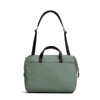 Bellroy Via Work Bag (Tech Briefcase) in muted green with black handles and adjustable shoulder strap