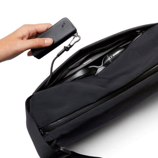 Bellroy Venture Sling 6L in black recycled fabric with organized interior compartments and key holder clip