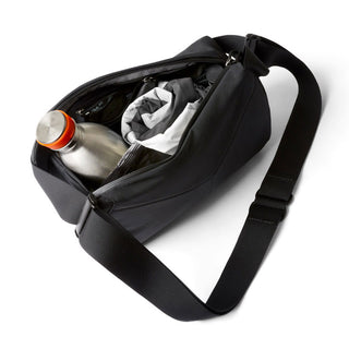 Bellroy Venture Sling 6L in black with durable fabric, showing spacious interior and adjustable strap